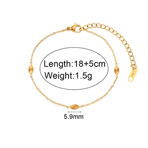 Detail showing 18K gold-plated chain with three engraved oval pendants and lobster clasp