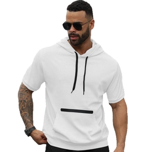 Men's white short sleeve hoodie featuring waffle texture, black drawstrings, and a zip pocket