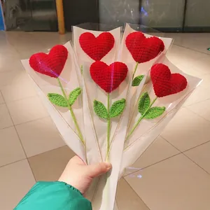 Handmade crochet heart flower bouquet with green leaves for Mother's Day and Valentine's Day