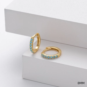Detailed view of 8mm gold plated S925 silver hoop earrings with inlaid blue turquoise stones