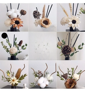 Assorted dried flower bouquet elements with cotton and pine cones for home decor