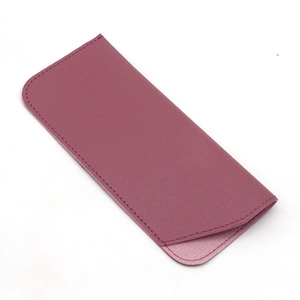 Pale pink textured PU leather eyewear pouch with neat stitching on white background