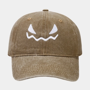 Detailed embroidery of monster face on washed cotton vintage baseball cap
