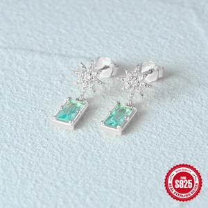 S925 sterling silver star drop earrings featuring an emerald cut green gemstone