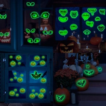 Luminous Halloween stickers showing glowing eyes, bats and pumpkins in dark settings