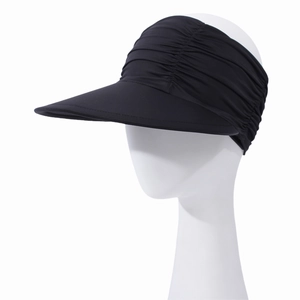 Detail view of the black ruched wide brim sun visor on a mannequin head for women
