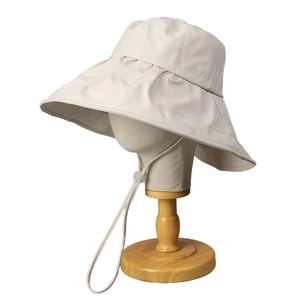Women's beige wide brim sun hat with adjustable windproof rope for UV protection