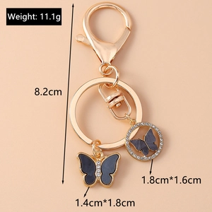 Detailed view of rhinestone butterfly keychain with precise weight and size dimensions