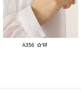 Close-up of white chiffon top with transparent pleated cuffs design and soft texture