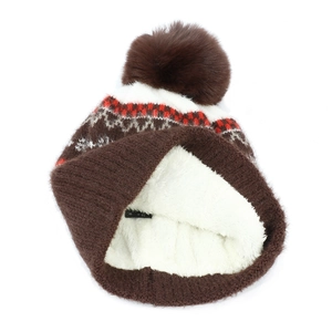 Women's winter knit beanie with pompom, ethnic pattern, and warm fleece lining