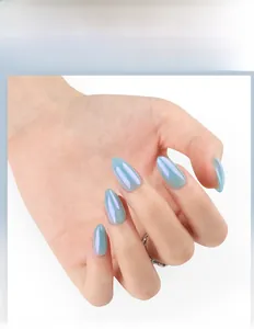 Macro shot of blue aurora cat eye almond nails with shimmering pearlescent finish