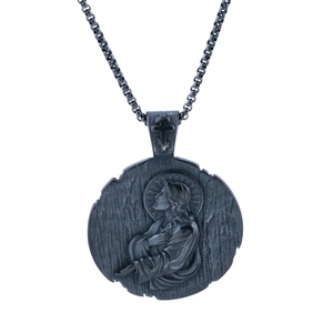 Vintage St. Benedict pendant necklace in antique silver with embossed religious icon