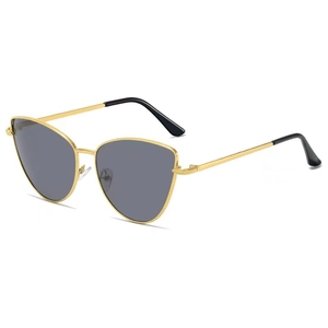 Fashionable women's cat eye sunglasses with gold metal frame and dark smoke lenses