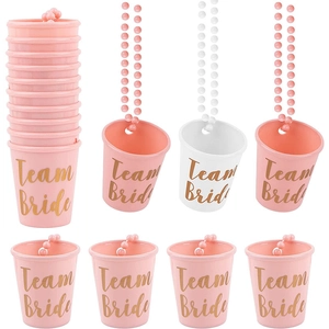 Pink and white Team Bride plastic shot glasses with matching beaded necklaces
