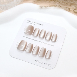 Handmade champagne cat-eye press-on nails set in elegant pearl finish square-round shape