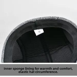 Detail view of duckbill cap interior with size 58 label and soft sponge padded lining