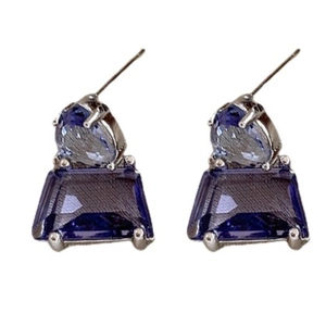 Silver needle earrings featuring deep blue and light blue geometric zircon crystals