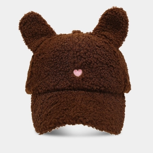 Detailed view of dark brown teddy fleece baseball cap with cute ears and pink heart embroidery