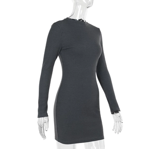 Detail view of dark grey ribbed knit texture on a slim fit long sleeve dress