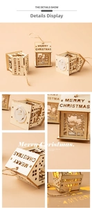 Detailed view of hollow wooden Christmas house ornament with LED light and deer motif