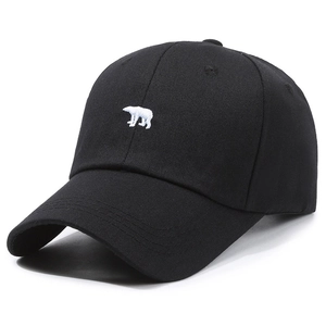 Classic black cotton baseball cap featuring white polar bear embroidery on the front