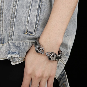 Men's vintage skull charm braided leather bracelet in antique silver finish