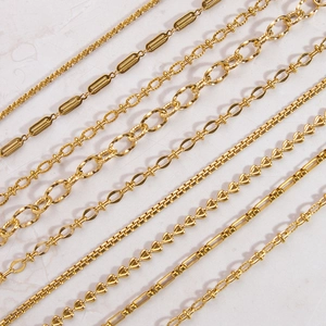 Multiple 18K gold plated stainless steel Cuban and link chains in various textures