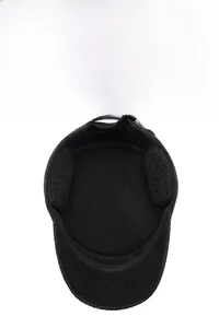 Detailed view of the thick fleece lining and ear protection inside the men's winter cap