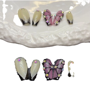 Cyberpunk black butterfly press-on nails with purple gradients and sparkling crystals