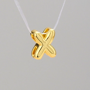 Polished golden balloon style letter X pendant necklace with a 3D bubble effect