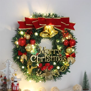 Christmas wreath with LED lights, red bows, and gold ornaments for holiday door decoration