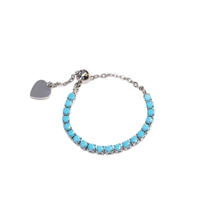 Adjustable blue bead ring with silver heart charm and metal slide clasp minimalist style