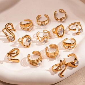 Collection of golden irregular open rings with sparkling zircon inlay for women