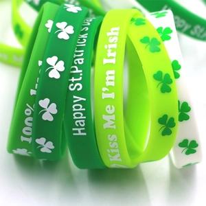 St. Patrick's Day green silicone wristbands featuring clover prints and festive slogans