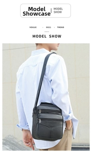 Black leather crossbody bag with multiple zippers and adjustable strap shown on model