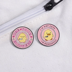 Funny cartoon duck enamel pins with humorous quotes on white canvas bag accessories