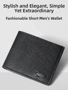 Macro detail of men's short wallet in black litchi pattern leather with metal trim