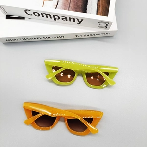 Vintage cat eye sunglasses in candy neon green and tortoiseshell resin frames