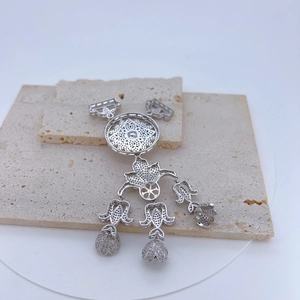 Elegant silver sunflower pendant necklace with zircon floral accents on a stone base