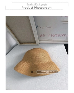 Detail shot of the tight weave texture on this foldable straw sun hat for women