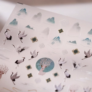 Golden foil nail art stickers with traditional Chinese landscape and crane motifs