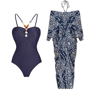 Dark blue textured one-piece swimsuit with beaded details and floral beach cover-up set