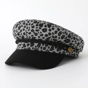 Stylish retro leopard print baker boy hat for women featuring black brim and gold button