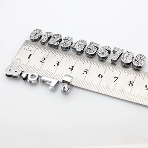 8mm silver-toned DIY slider charms with white rhinestones on a measurement scale