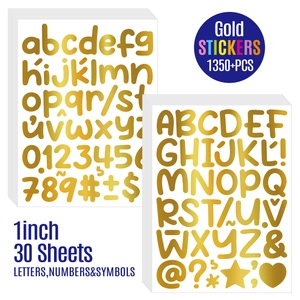 Macro detail of 30 sheets gold metallic 1-inch alphabet and number stickers set