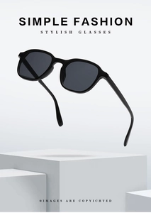 Close-up of classic round black sunglasses on a minimalist white geometric stand