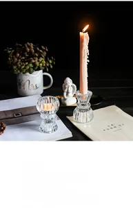 European ribbed glass candle holders with warm candlelight for table decor