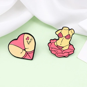 Pink heart-shaped butt and bikini body enamel pins in creative pop art style