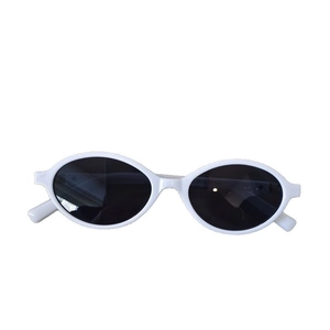 Retro oval kids sunglasses with white frame and dark lenses for stylish sun protection