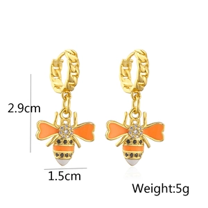 Detail view of 18K gold plated bee earrings with enamel details and dimensions